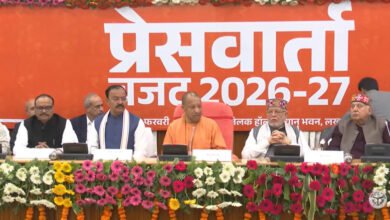 Suresh Khanna presenting UP Budget 2026 in Vidhan Sabha with Yogi Adityanath.