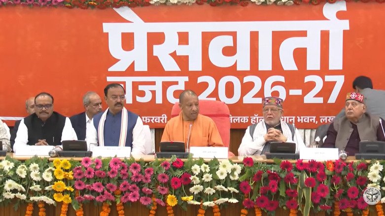 Suresh Khanna presenting UP Budget 2026 in Vidhan Sabha with Yogi Adityanath.
