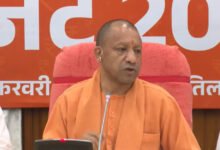Suresh Khanna presenting UP Budget 2026 in Vidhan Sabha with Yogi Adityanath