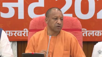 Suresh Khanna presenting UP Budget 2026 in Vidhan Sabha with Yogi Adityanath