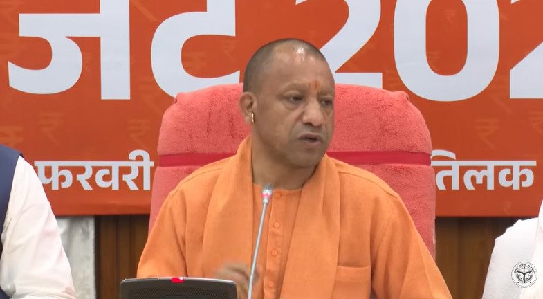 Suresh Khanna presenting UP Budget 2026 in Vidhan Sabha with Yogi Adityanath